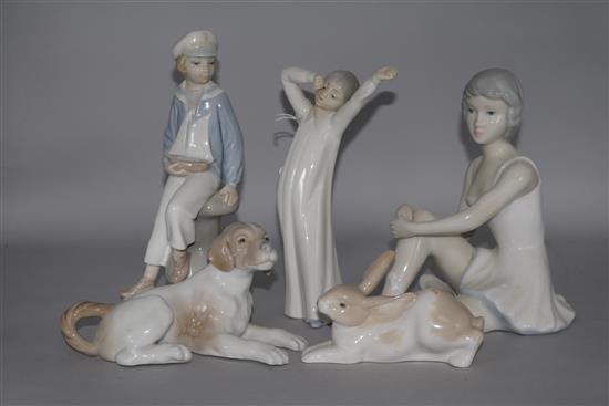 A group of Lladro and Nao porcelain figures